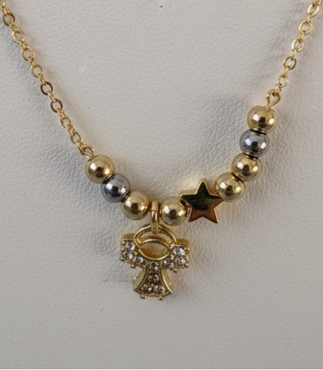 Dainty gold-tone beaded necklace with a little girl charm and star pendant—minimalist, perfect for layering, gifting, and everyday wear